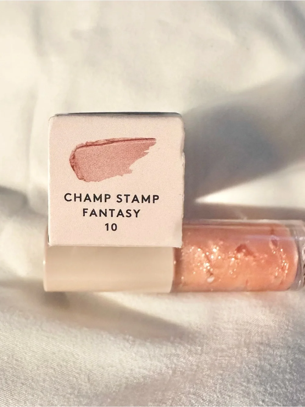 Fenty Beauty Gloss Bomb Lip Luminizer — Shimmery Peachy Gold